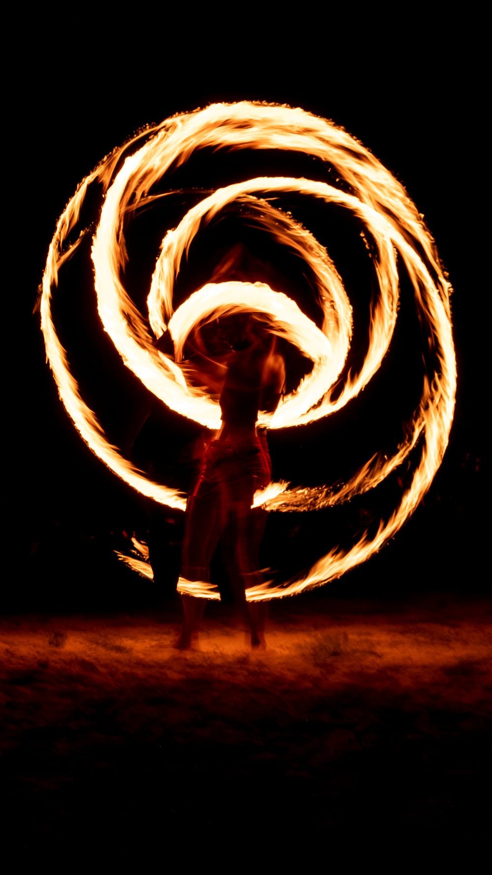 Fire spinning after dark