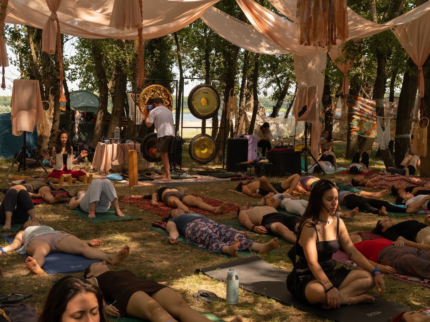 A gong bath under the trees