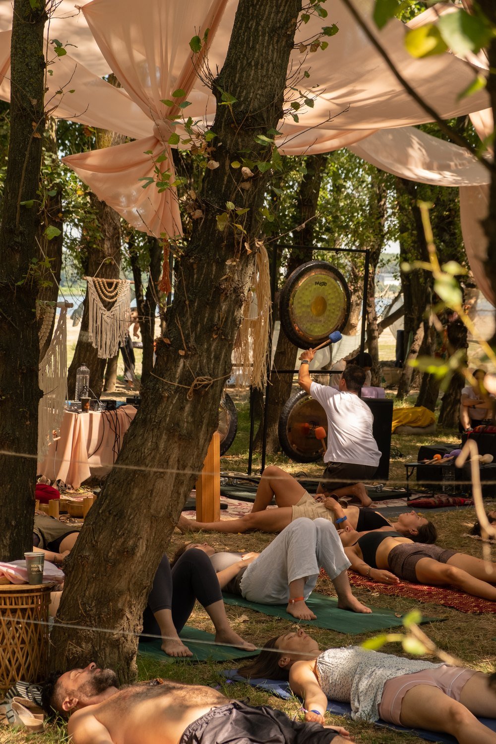 A gong bath under the trees