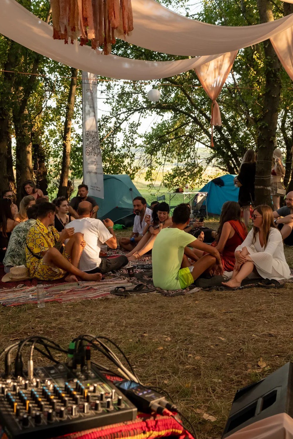 People gathered under the canopy