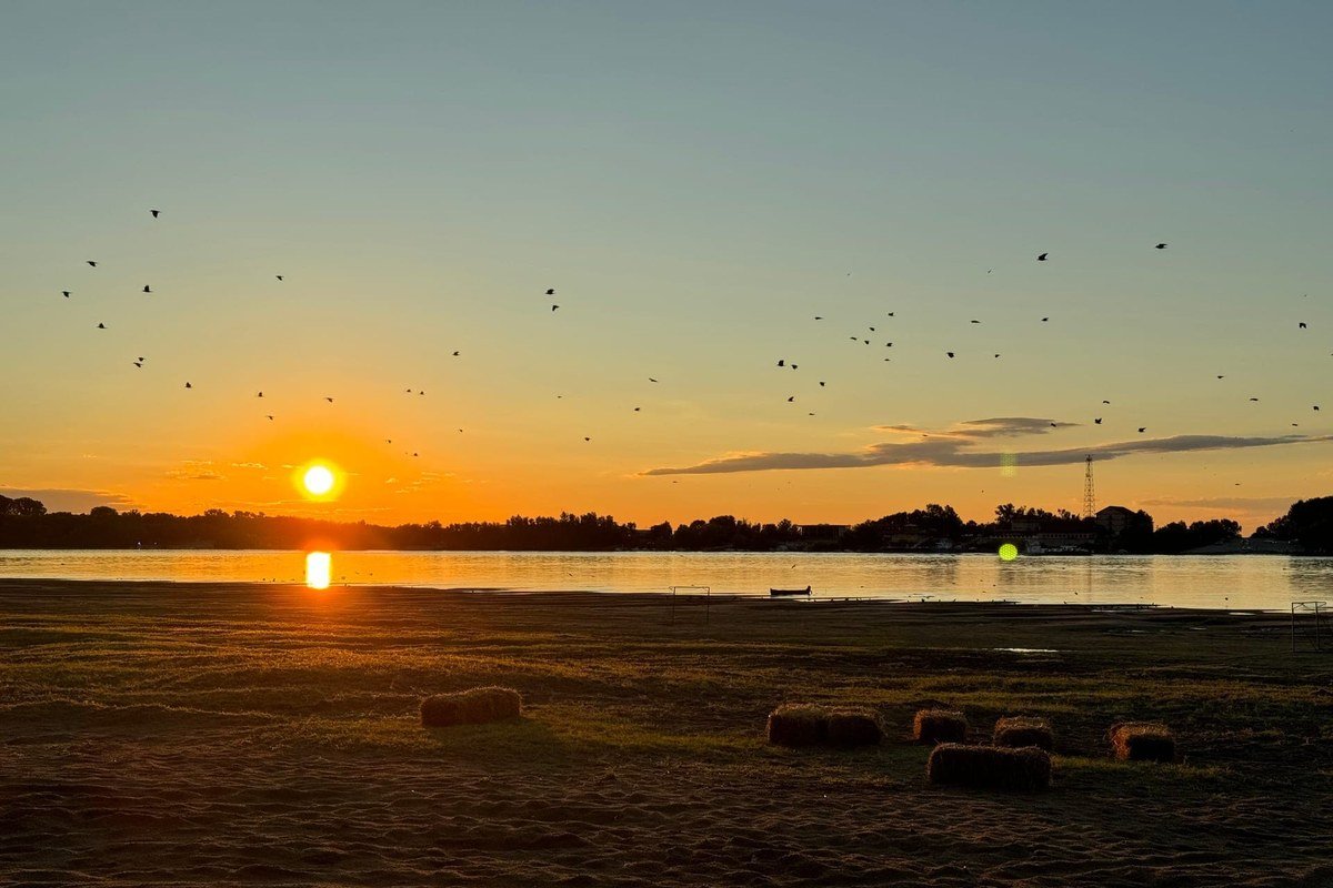 Sunset over the Danube from the island beach